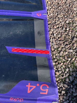 
                  
                    Load image into Gallery viewer, 2023 Duotone Duke 5.4 m (head panel patch) Used windsurfing sails
                  
                